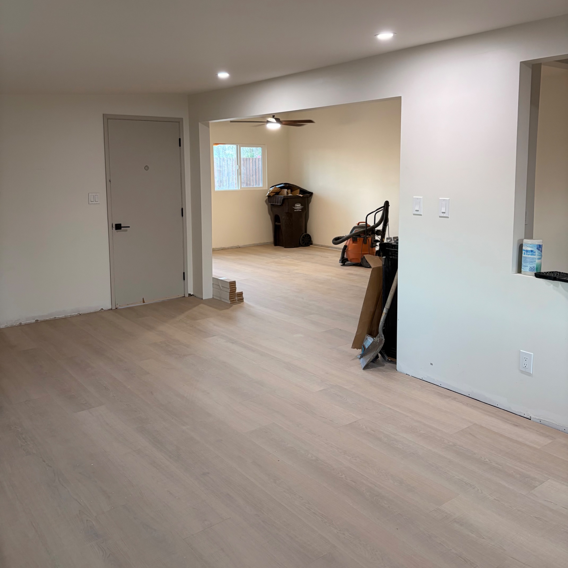 Real NPV FLOORS warm brown plank flooring installation in a Palm Springs living area